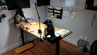 UPLIFT V2 Bamboo Standing Desk and a Bamboo Motion-X Board