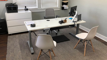 GREENGUARD-certified white laminate height adjustable desk by UPLIFT Desk