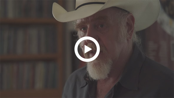 Ray Benson from Asleep at the Wheel at his UPLIFT Desk